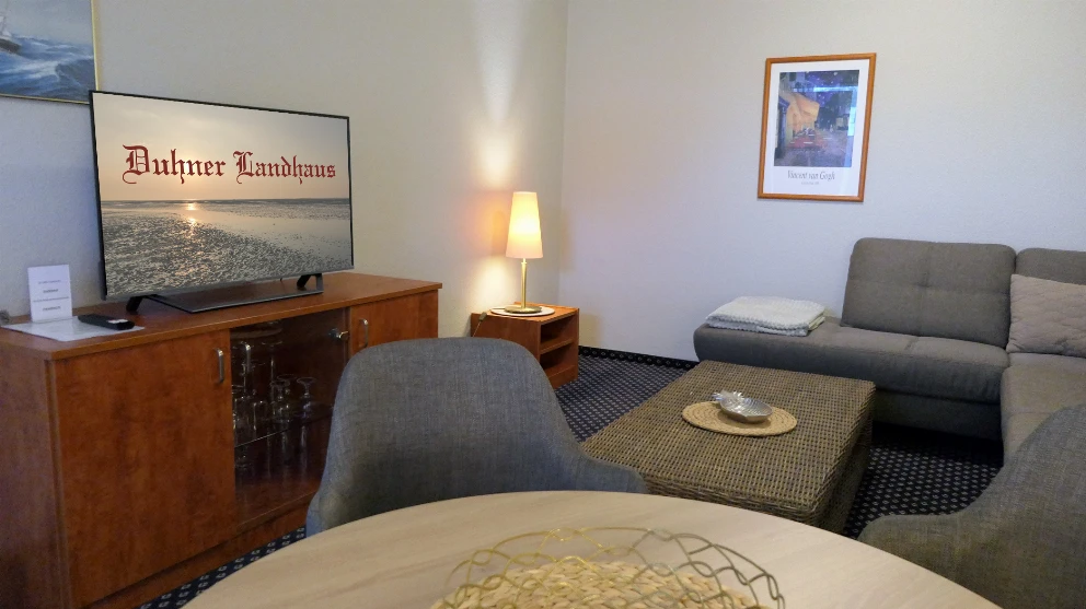 Wohnzimmer einer Ferienwohnung für bis zu 4 Personen im Godewind in Duhnen