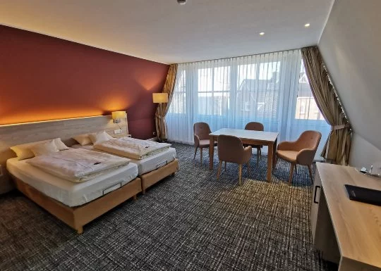 Dreibettzimmer im Hotel Duhner Landhaus